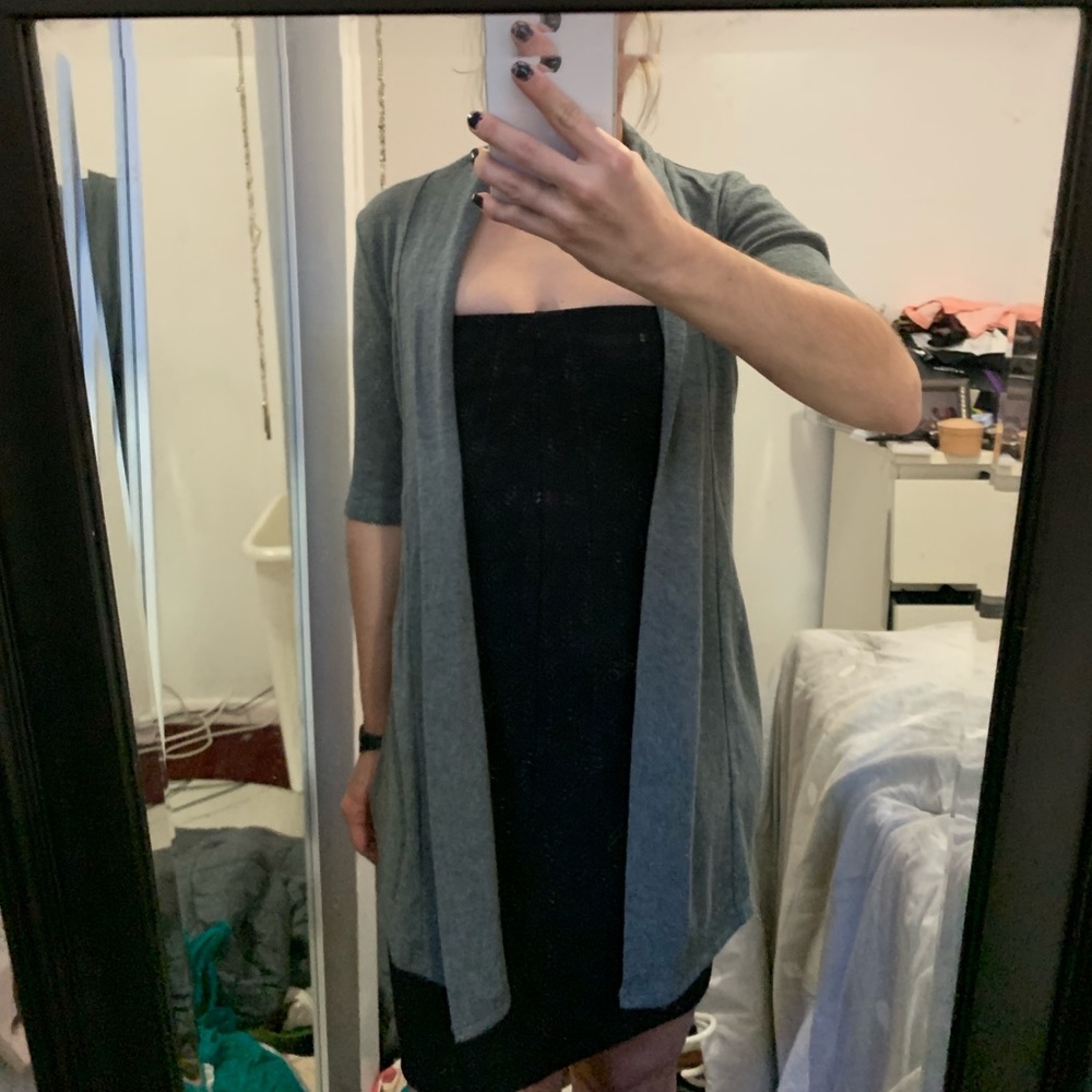 Grey elbow length arm, thigh length sweater